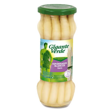 Un frasco de vidrio de espárragos blancos Gigante Verde con tapa verde y etiqueta del producto en español.